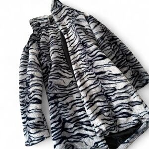 bebe Faux Fur Striped Jacket in Black and Cream